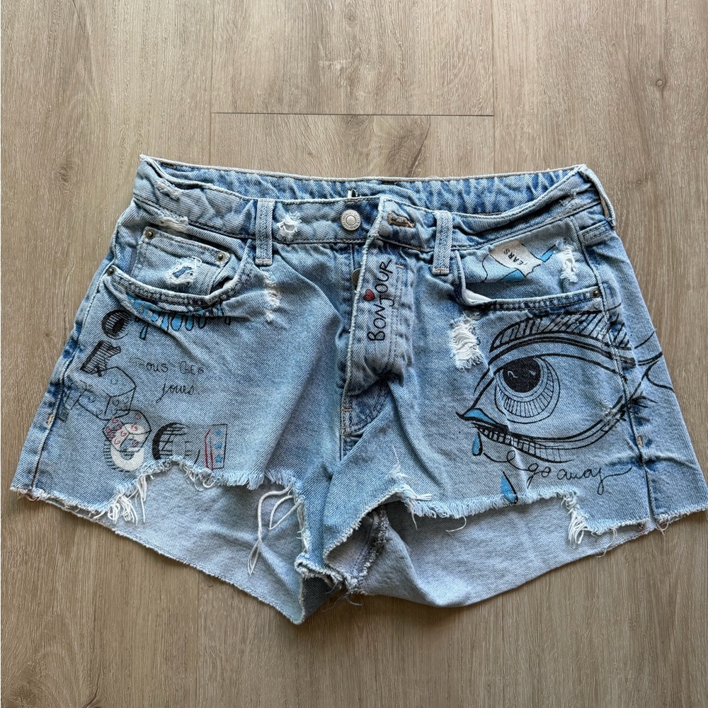 Zara Light Blue Distressed Denim Shorts with Graphic Eye Artwork